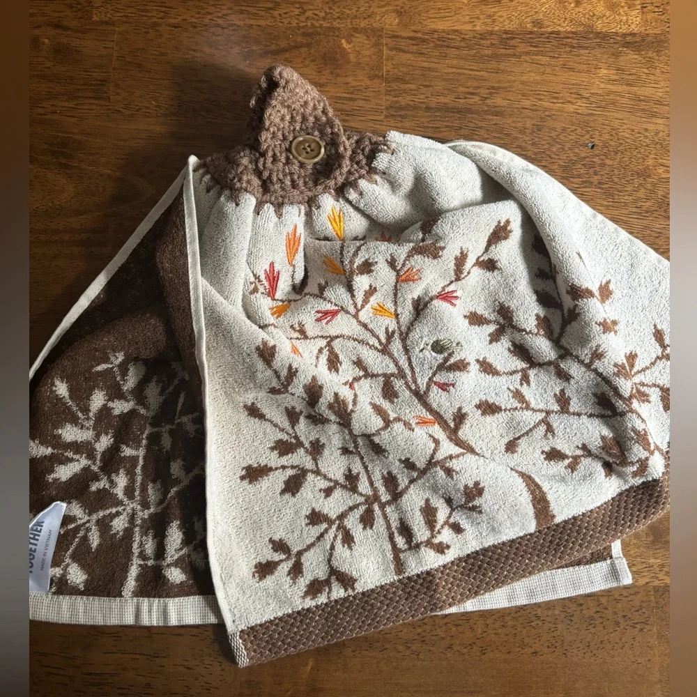 Hand crocheted fall tan/brown towel with embroidered leaves and bird